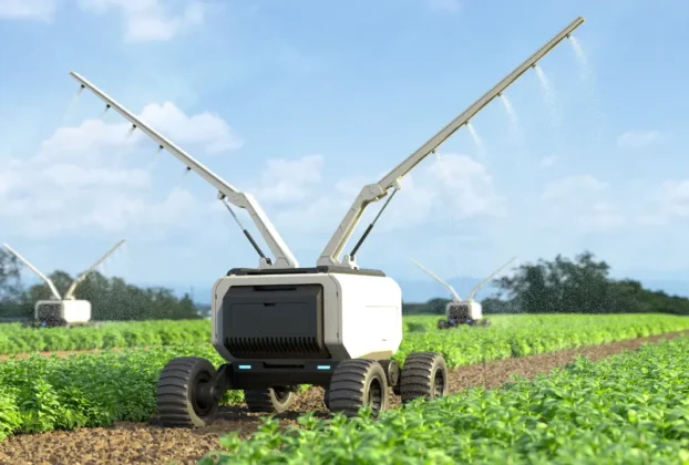 Um robô agricultor autónomo a mover-se de forma precisa por uma lavoura verdejante, simbolizando o futuro da tecnologia no campo.